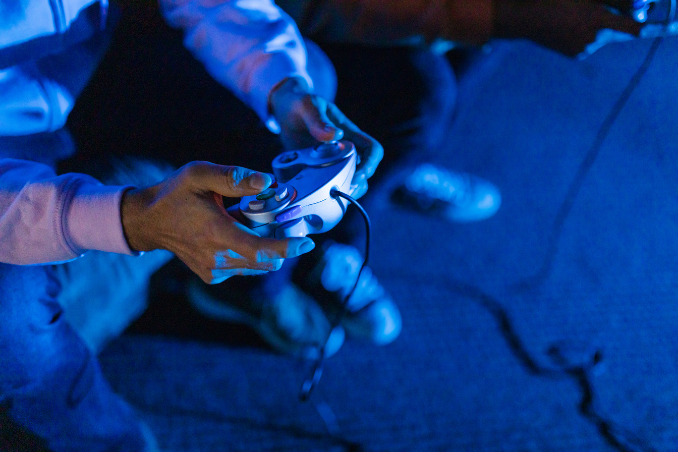 Close-Up View of a Person Holding Game Controller